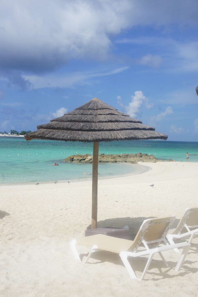 Lounge chairs on the beach at Sandals Royal Bahamian Resort