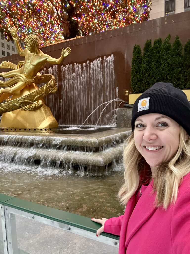 Christmas in New York City ice skating at Rockefeller Plaza Christmas Tree
