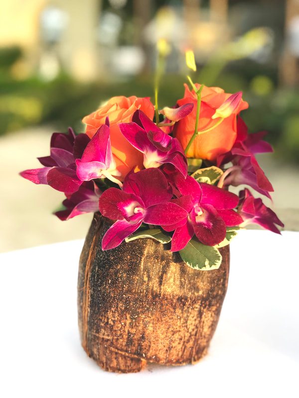 Coconut and floral decor at Sandals Resorts Wedding. 