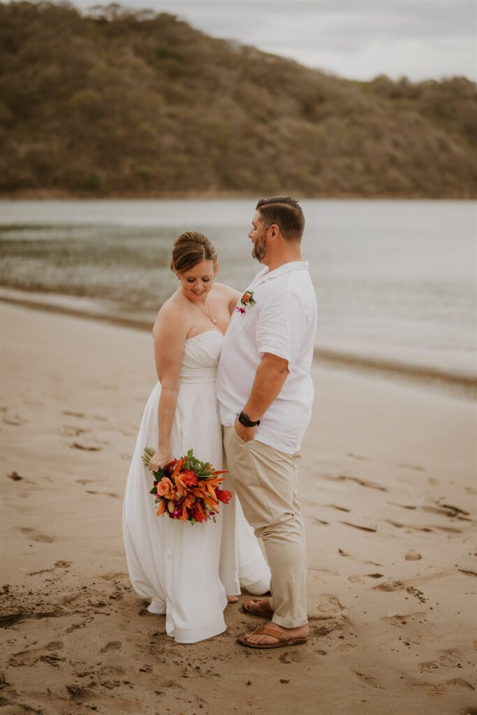 Real Destination Wedding Couple Jenn and Dan at Dreams Las Mareas Costa Rica bride and groom on the beach
