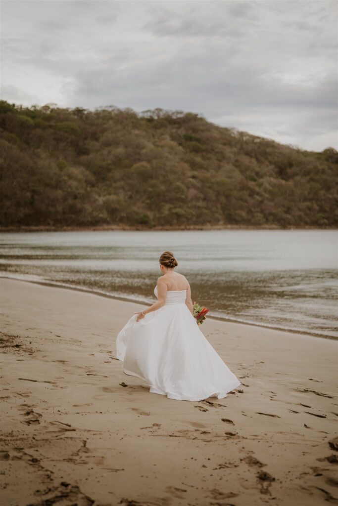 Real Destination Wedding Couple Jenn and Dan at Dreams Las Mareas Costa Rica bride on the beach