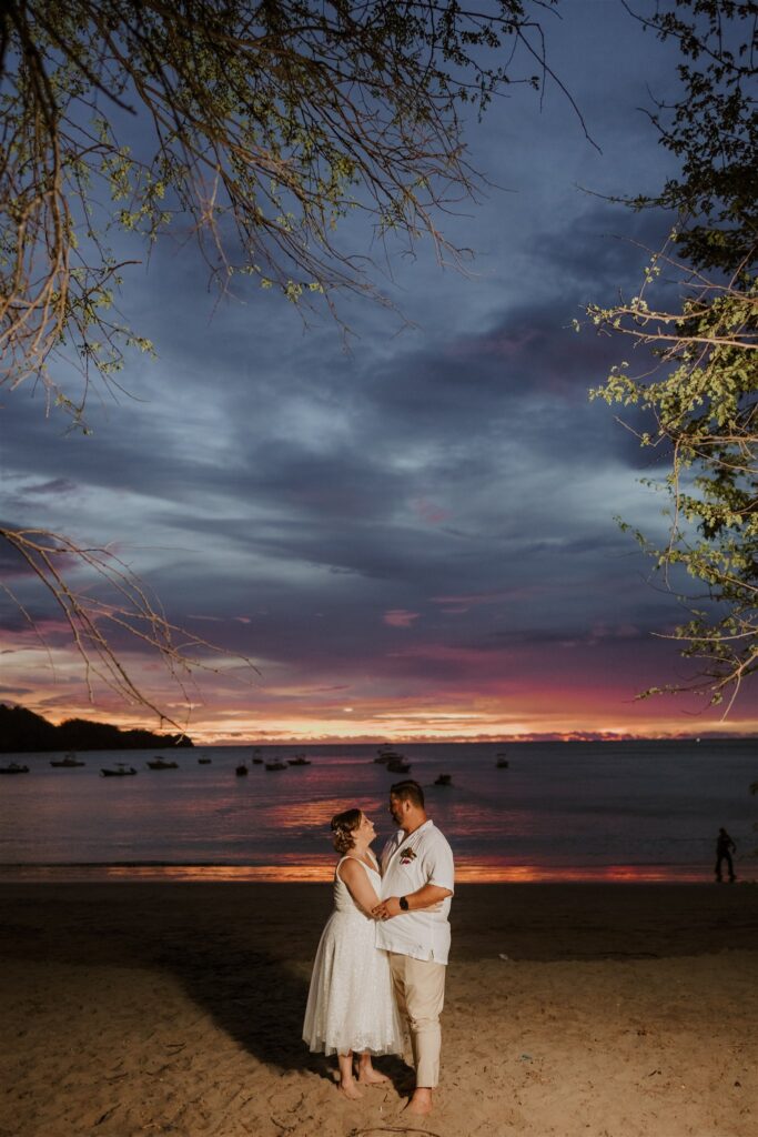 Real Destination Wedding Couple Jenn and Dan at Dreams Las Mareas Costa Rica Couple with the Sunset