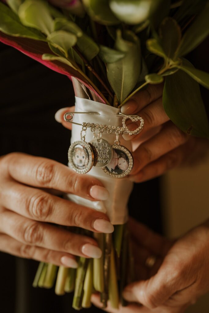 Real Destination Wedding Couple Jenn and Dan at Dreams Las Mareas Costa Rica bridal bouquet with memory charms