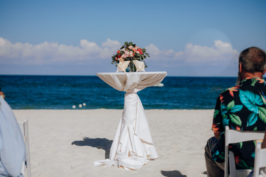 Beach Tropical Destination Wedding Ceremony Table with Flowers