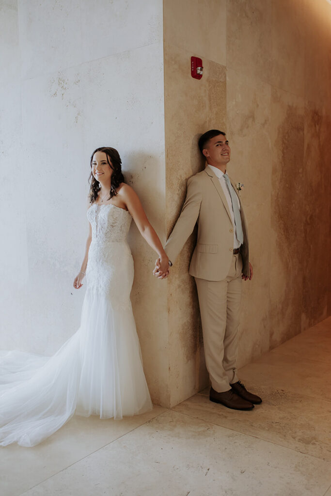 Lauren & Matthew's Destination Wedding at Dreams Vista Cancun | holding hands