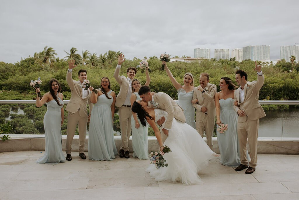 Lauren & Matthew's Destination Wedding at Dreams Vista Cancun | wedding party with bride and groom