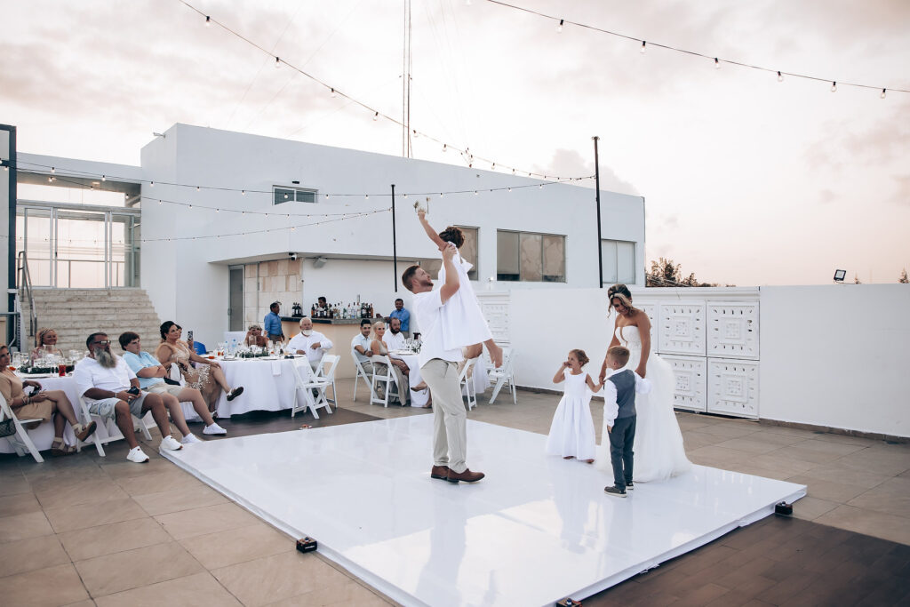 Family on the dance floor at a wedding