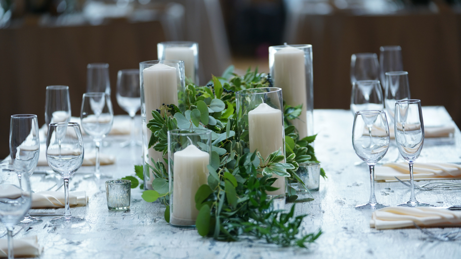 Unconventional Wedding Decor: greenery garland with candles as centerpiece