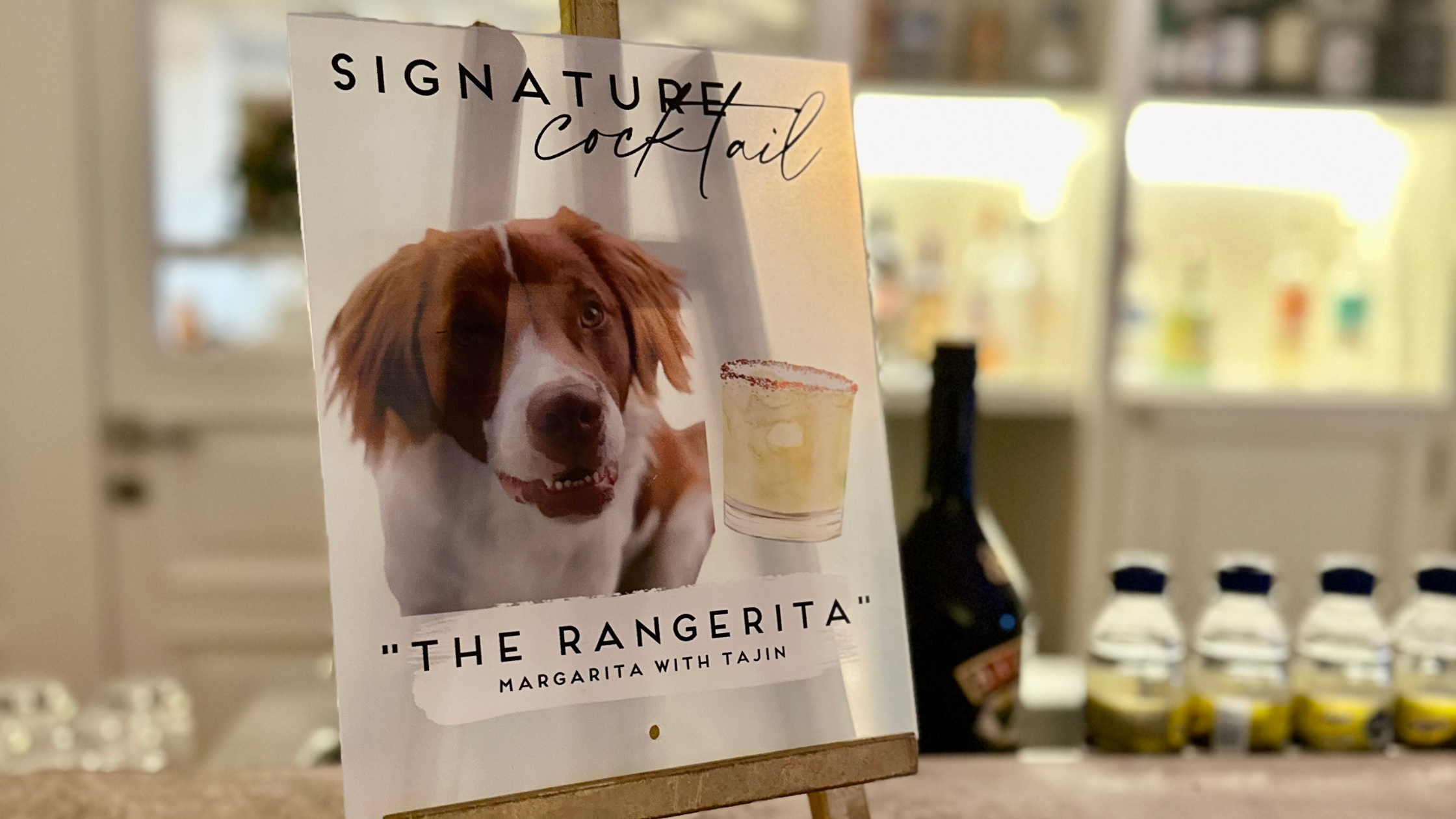 sign showing signature cocktail at wedding reception