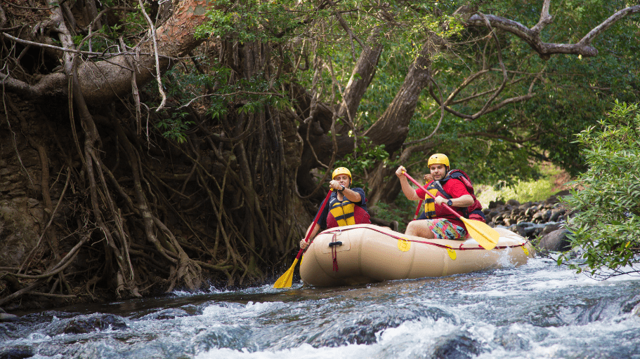 three people in raft whitewater rafting in Costa Rica