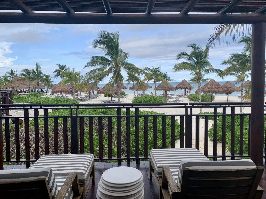 how to get married in mexico- gorgeous palm trees off of a balcony