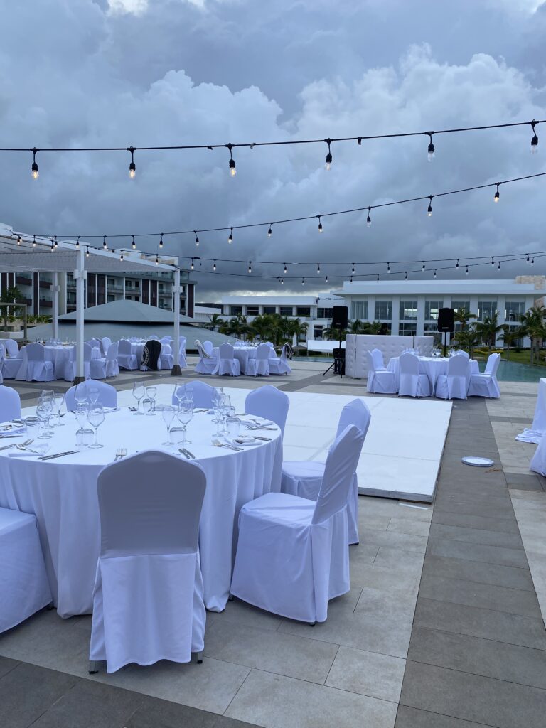 Open-air gazebo venue with ocean backdrop at Majestic Elegance.