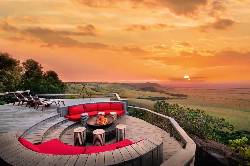 Romantic firepit deck with panoramic savanna views at sunset—an unforgettable setting in one of Africa’s top destinations.