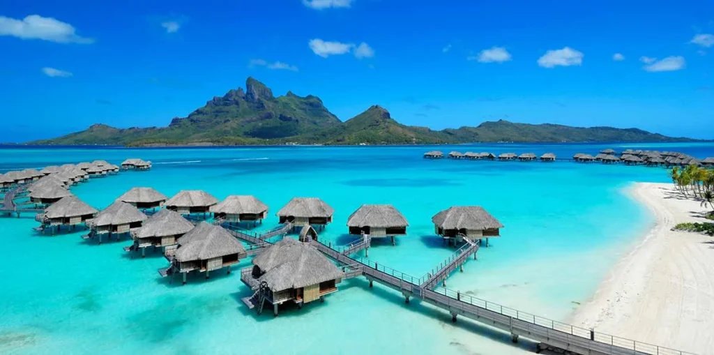 Iconic overwater bungalows in Bora Bora, one of the most stunning honeymoon destinations in the world.