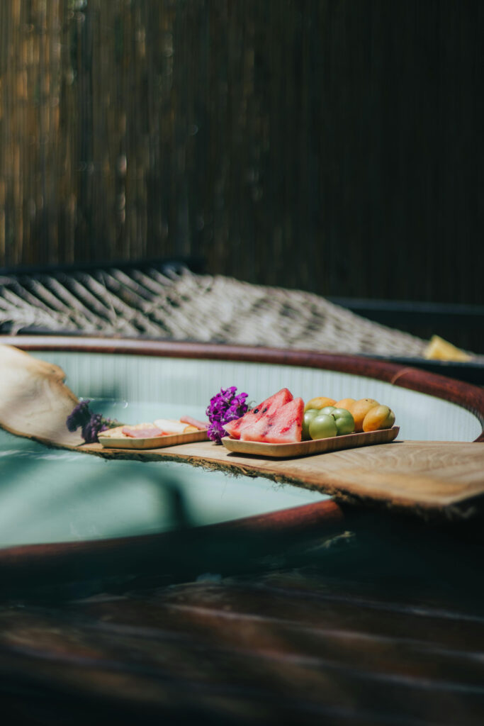 Fresh fruit served poolside during a tropical wedding retreat, perfect for post-ceremony relaxation and recharge.