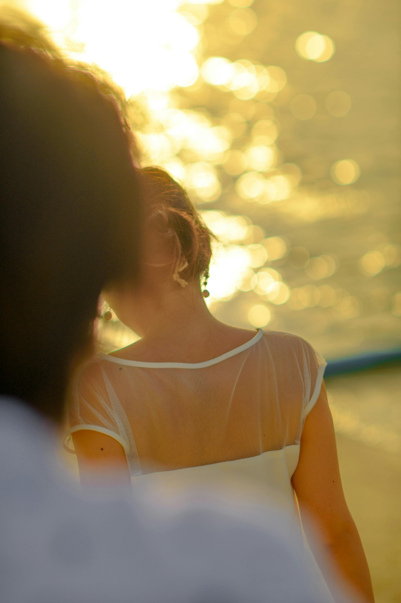 bride and groom walking on thebeach during their destination wedding