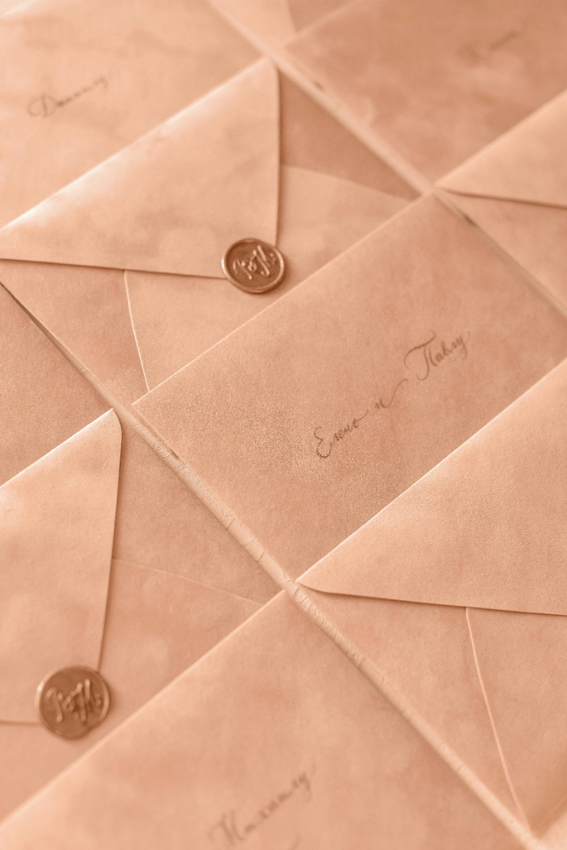 Blush wedding invitations with wax seal, a beautiful detail to plan early for your 2027 wedding.
