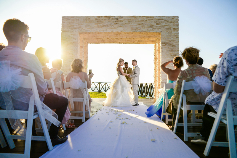 a couple getting married and creating a wedding guest experience