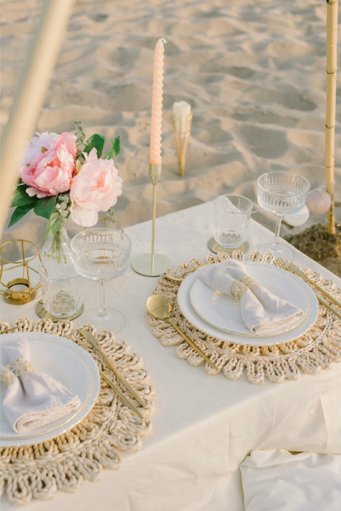 Elegant destination wedding reception table setting with neutral decor, helpful inspiration for a wedding planning checklist.